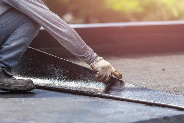 Professional Basement Waterproofing technician working in Kingston, OH
